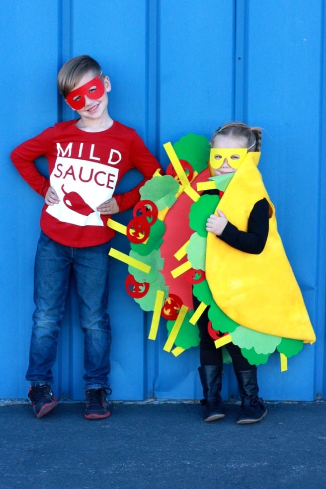 A little boy dressed up as Mild Sauce and a little girl dressed up as a taco!